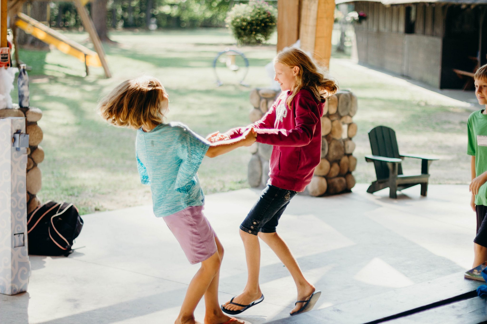 Two young girls dancing.