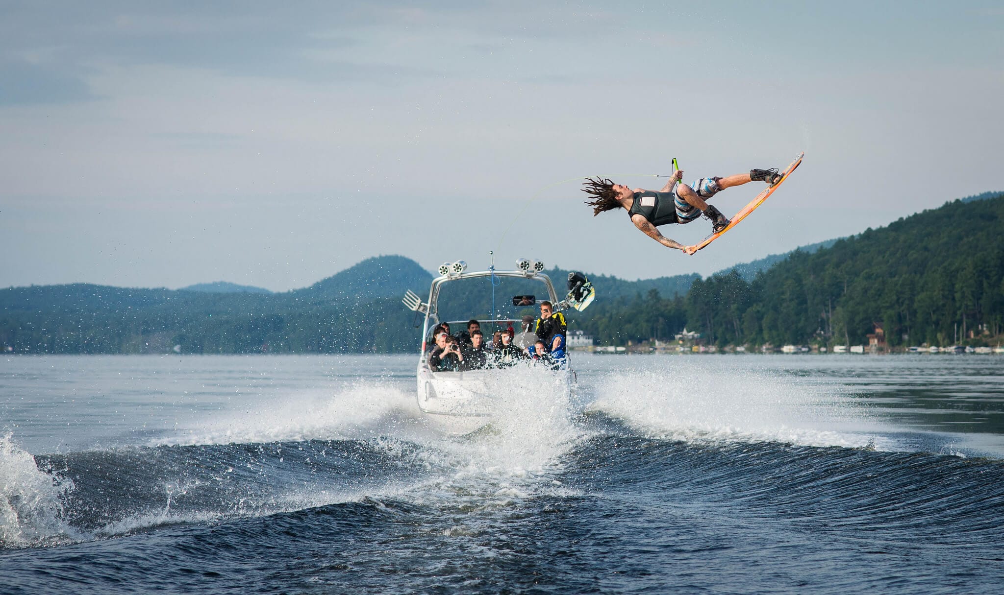 person wake boarding and in mid air.