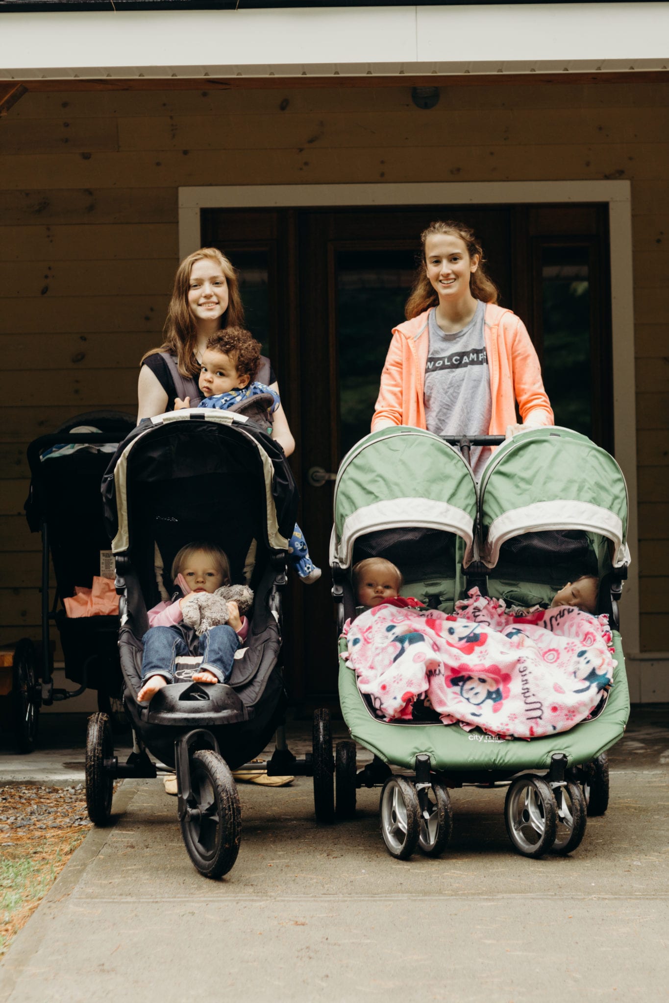 Two women with baby strollers